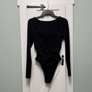 NWOT Black Long Sleeve Bodysuit